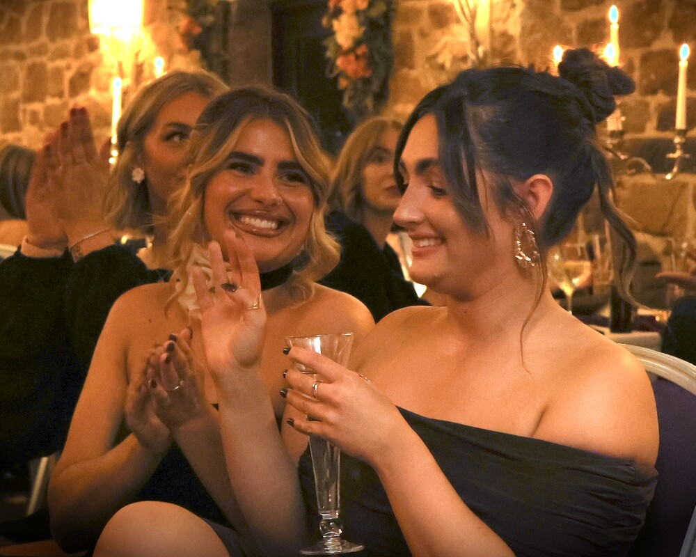 Two people at a celebration event.